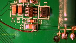 Close-up of a PCB section with SMD electronic components.