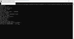 Black Windows console screen showing messages about flashing Tasmota firmware to an ESP8285 via esptool.py, with visible writing progress.