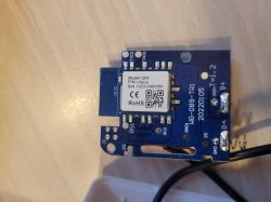 PCB board with CB3S module and labeled components on a wooden surface