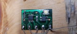 LED Controller Board with Button Printed circuit board with a button and electronic components.