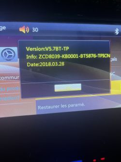 System display showing firmware version information V5.7BT-TP.