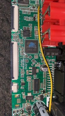 Circuit board with Allwinner Tech chip, yellow wire, and connectors.