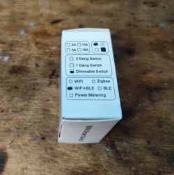 Side of the Tuya FS-05R dimmer packaging with feature markings.
