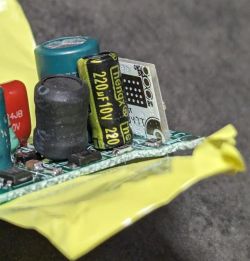 LN882HKI Electronic Module with Visible Capacitors Electronic module with capacitors on yellow insulating tape