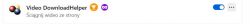 Zrzut ekranu rozszerzenia Video DownloadHelper w przeglądarce z ikoną włączania.