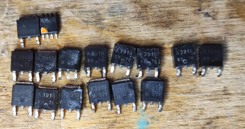MOSFET Transistors Recovered from Motherboard Desoldered MOSFET transistors from a motherboard.