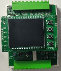 Electronic module with LCD screen, push buttons, and green terminal blocks