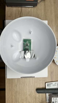 Interior of Smart Lamp with BK7231N Chip Interior of a smart lamp with a visible circuit board and wires.