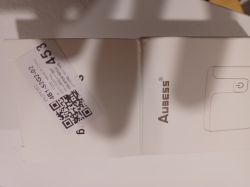 Close-up of an Aubess device box with a QR code sticker.