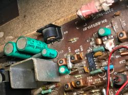 Circuit Board in Unitra Sudety R-208 Radio Receiver Close-up of a circuit board with Elwa electrolytic capacitors in the Unitra Sudety R-208 radio receiver.