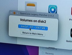 OpenCore Legacy Patcher - Volume Selection OpenCore Legacy Patcher window showing volumes on disk2.