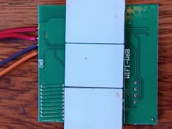 WIFI-W6B Printed Circuit Board with Wires Printed circuit board labeled WIFI-W6B connected to wires.