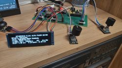 Prototype electronic set with a display and joystick.