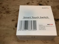 AVATTO Smart Touch Switch Box White box of the Smart Touch Switch by AVATTO on a wooden surface.