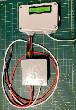 Electronic system in enclosure with LCD display and temperature sensors