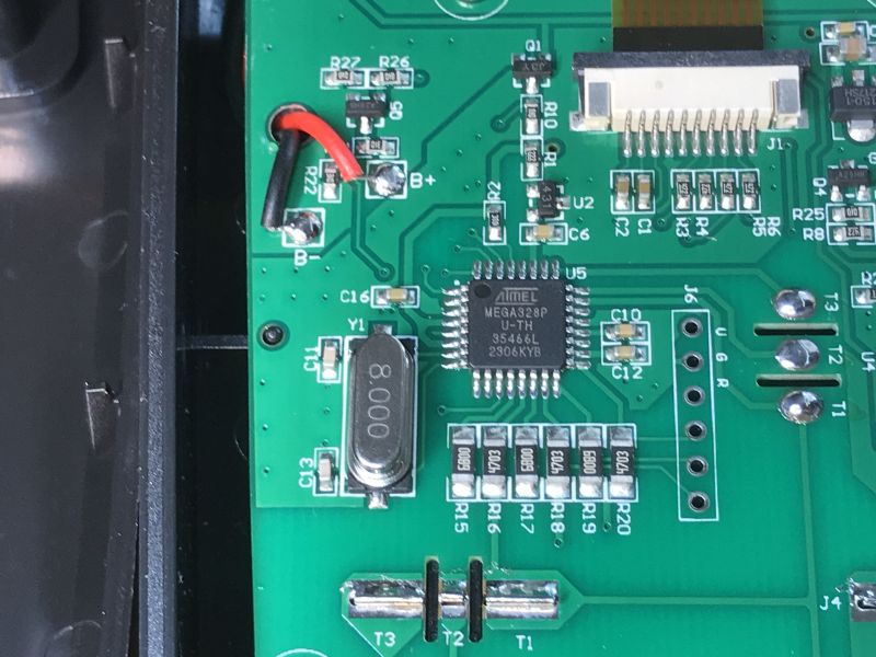 Inside of BSIDE ESR02 Pro Tester BSIDE ESR02 Pro component tester with visible Atmega328P chip.