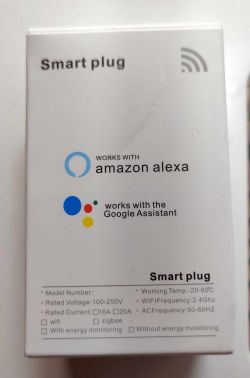 Smart plug packaging with Amazon Alexa and Google Assistant information.