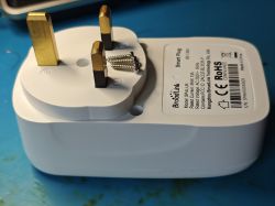 BrodLink SP4L-UK smart plug with screws placed on top of the pins