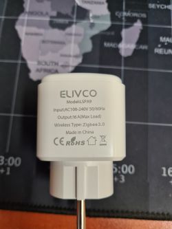 View of an ELIVCO smart plug against a map background.