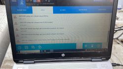 Diagnostic Screen Displaying Vehicle Error Codes A laptop screen showing a list of vehicle diagnostic error codes.