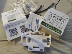 Wi-Fi+RF curtain module with manual and accessories.
