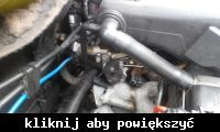 What is leaking from under the throttle and the air filter box? [photos]