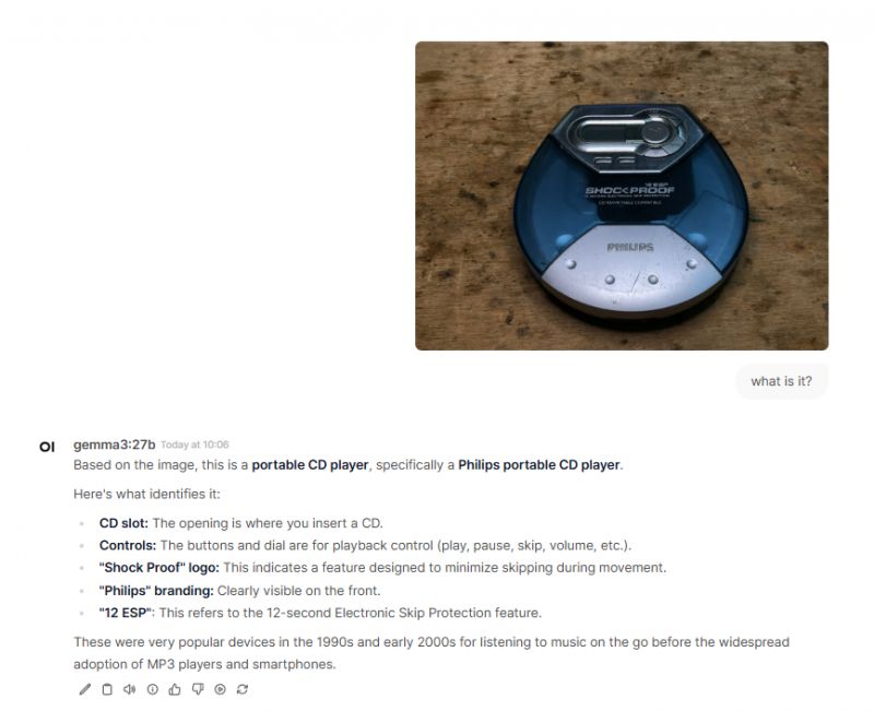 Philips Portable CD Player Philips portable CD player on a wooden surface.