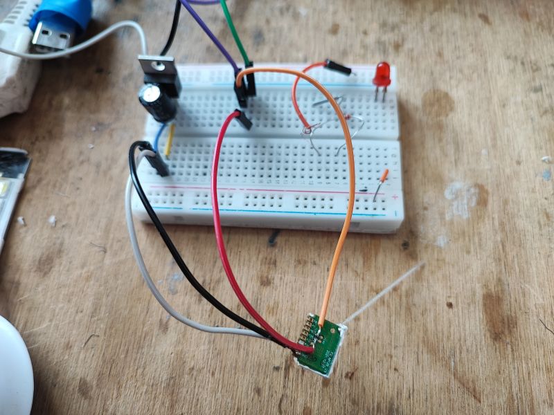 Prototype Electronic Circuit on Breadboard Breadboard with an electronic circuit connected to several wires.