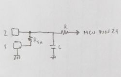 Hand-drawn simple electrical diagram showing two pads connected via a shunt resistor, capacitor, and resistor to MCU pin 21.