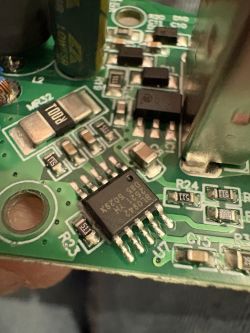 Close-up of a PCB with a SOIC IC and surrounding SMD components