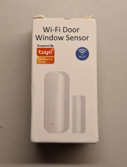 Packaging of the Tuya Wi-Fi door and window sensor.