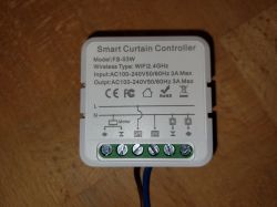 Smart curtain controller model FS-03W with technical specifications and connectors.