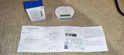 WiFi Mini Fan Breaker set with user manual on a carpet