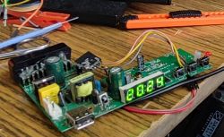 Electronic Circuit with LED Display Close-up of an electronic circuit with a LED display showing 2024.