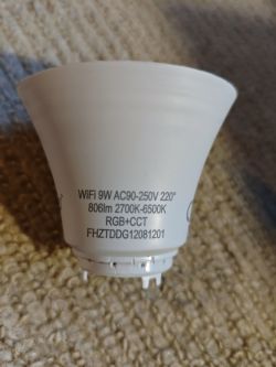 WiFi 9W LED bulb with technical specifications on the casing.