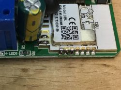 Close-up of the CBU electronic module with soldered components on the PCB.