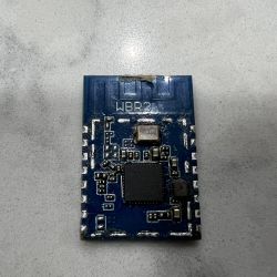 WBR3 Wi-Fi/Bluetooth Communication Module from Della Optima Mini Split WBR3 module with exposed electronics shown from above, featuring a visible integrated circuit.