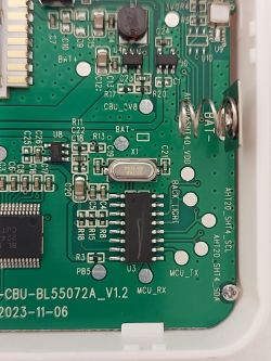Close-up of the interior of the Tuya WiFi TH08B temperature and humidity sensor showing the circuit board.