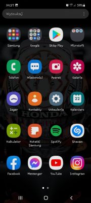 Samsung A52S - nieprzezroczysta tapeta w telefonie w menu głównym.