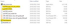 Screenshot of a folder showing various files including binary and PDF documents.