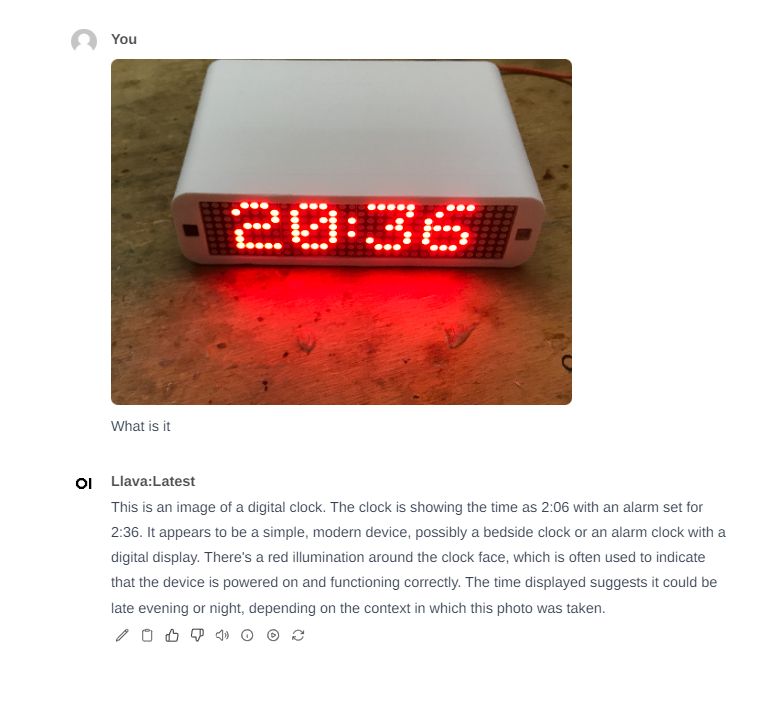 Digital Clock with LED Display Digital clock with red illumination displaying the time 20:36.