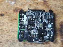 Interior of the Tuya FS-05R dimmer showing electronic components on the PCB.