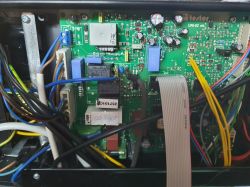 Close-up of the internal electronics of an Ecocondens Plus Gold 35 kW boiler.