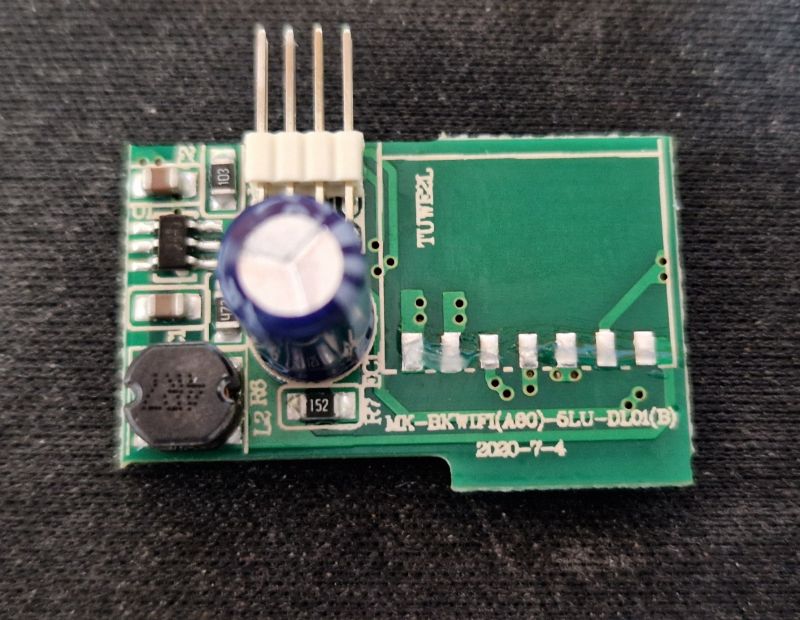 Converter Board with Electronic Components Converter board with visible capacitor and pins.