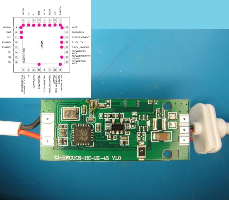 PCB with electronic components and a microcontroller pinout diagram in the upper left corner.