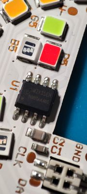 Close-up of electronic components of a bulb with SM2135EH chip.