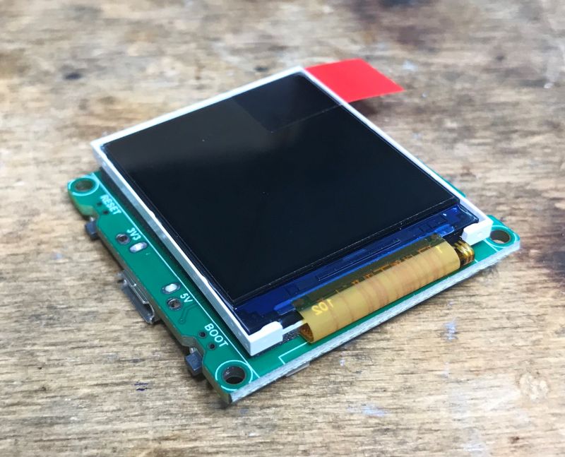 LCD Display Module LCD display module on a wooden table.