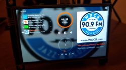 Waveshare display showing Moode Audio interface with WDCB 90.9 FM radio station