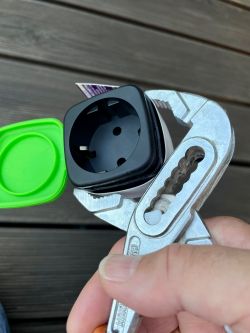 Example of using a pipe wrench to open a plug.