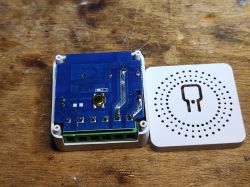 MPD-1CH electronic module with open case on wooden surface